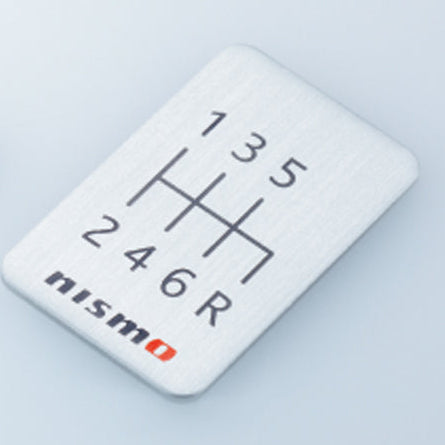 Nismo - ALUMINUM SHIFT PATTERN LABEL, 6-SPEED - 96935-RN009 - Rzcrew Garage