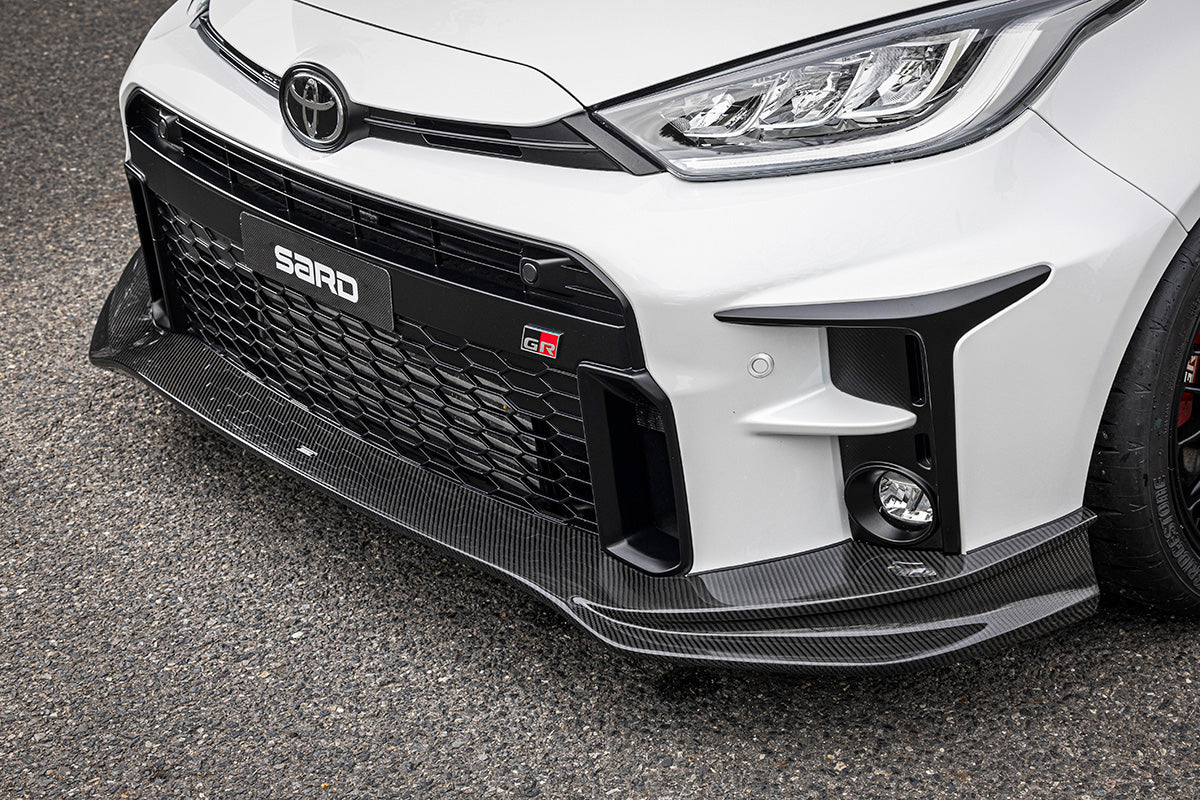 Sard - FRONT HALF SPOILER Gen1 FRP Carbon fiber (clear coated) - Toyota - Yaris GR GXPA16 Prior Facelift - Default Title 81212 - Rzcrew Garage