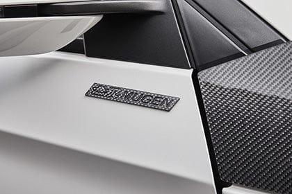 Mugen - Carbon Emblem - 90000-YZ8-C606 - Rzcrew Garage